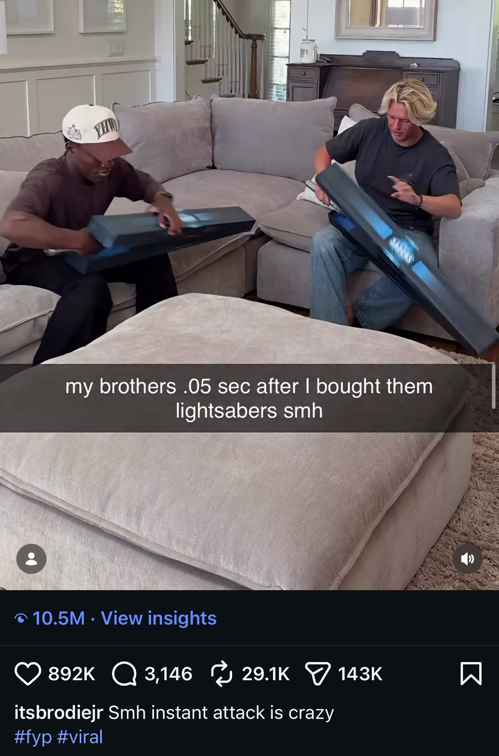 Two adult creators opening separate SWA Sabers packages together